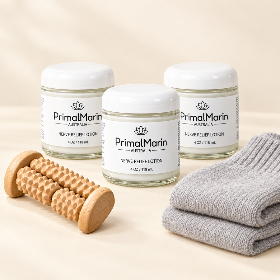 Three PrimalMarin jars with a foot massage roller and soft socks