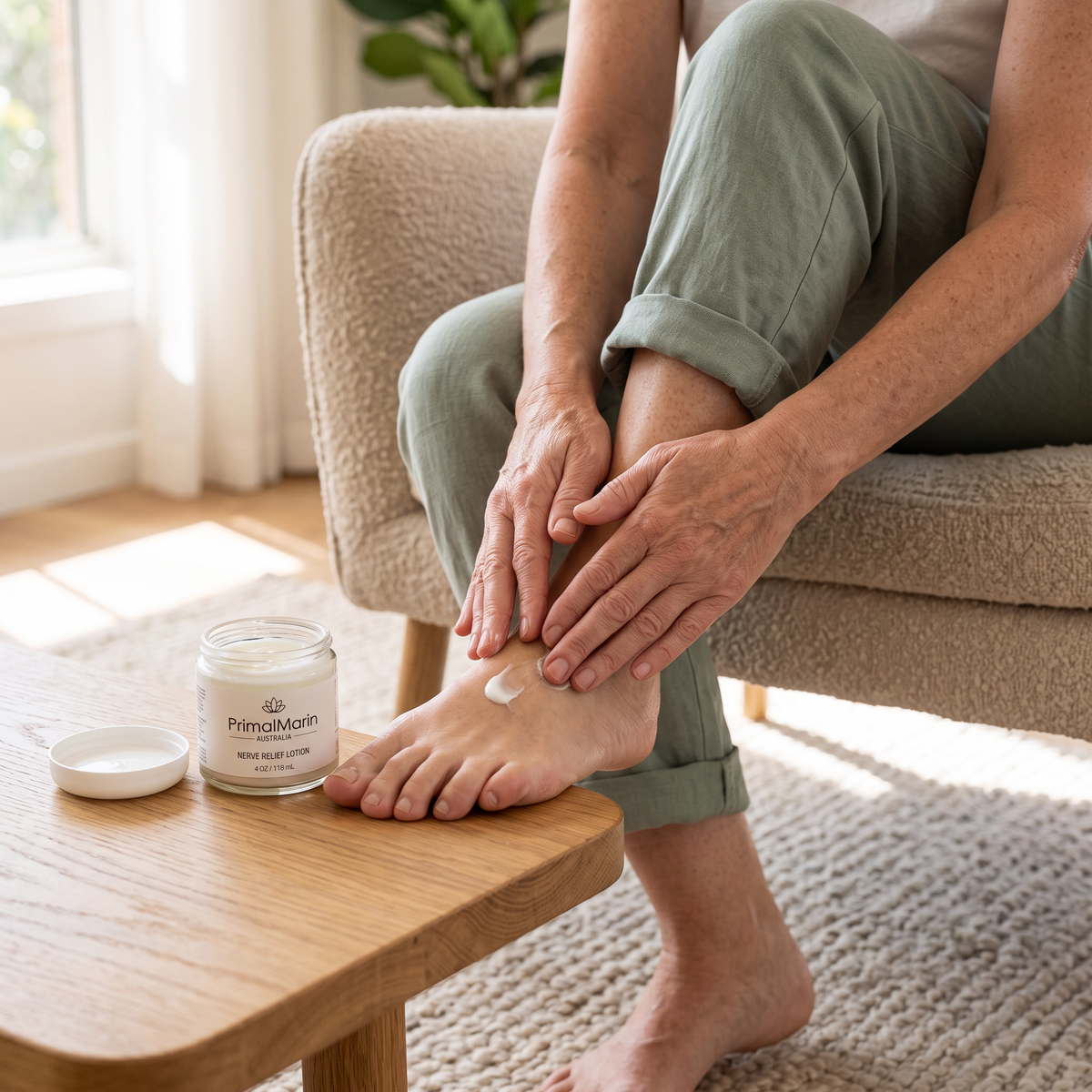 Illustrative scene of a woman applying PrimalMarin lotion to her foot